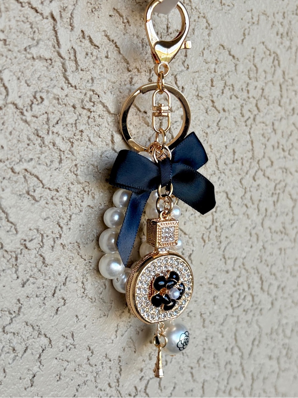 Luxe Gold & Rhinestone Perfume Bottle Ribbon & Pearl Accent Charm Keychain - Picture 3 of 8